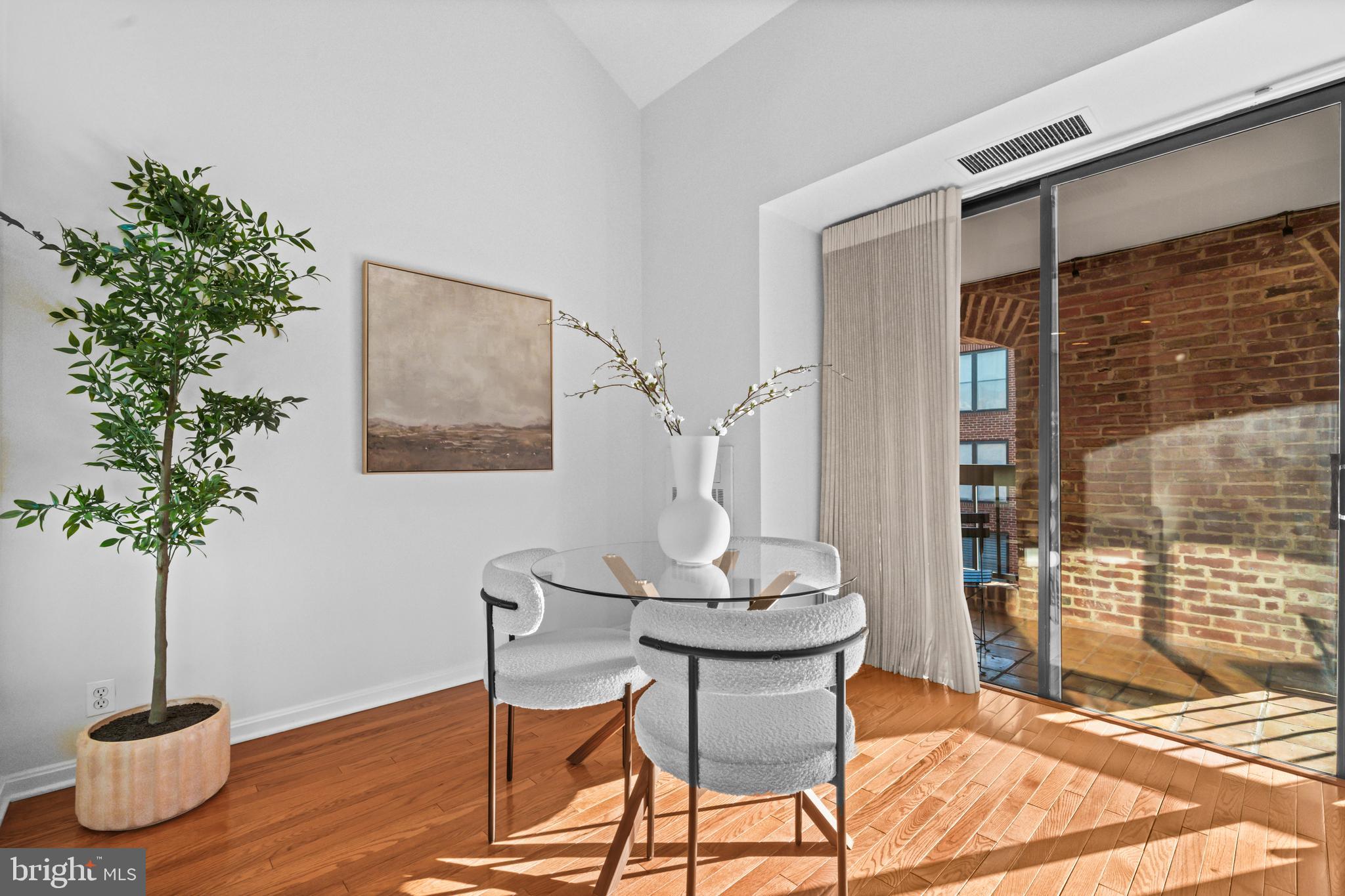 3225 Grace Street Northwest, Unit 219 Washington, DC 20007 - Photo 8 of 45 a view of a livingroom with furniture and window