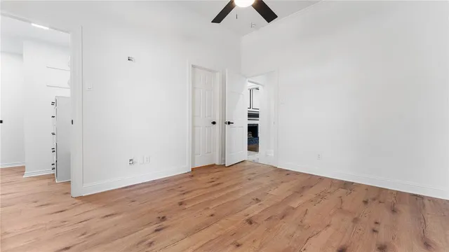 a view of a livingroom with furniture and staircase