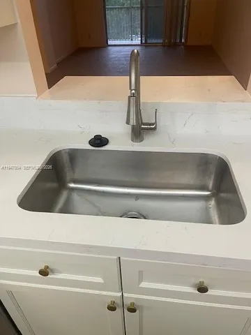 a close view of sink and a tap
