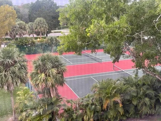 a view of balcony with yard