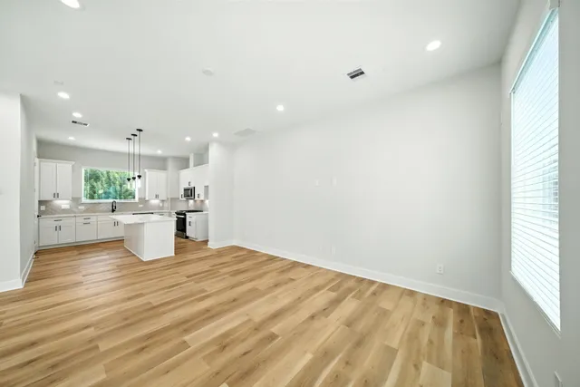 a view of a kitchen with a sink