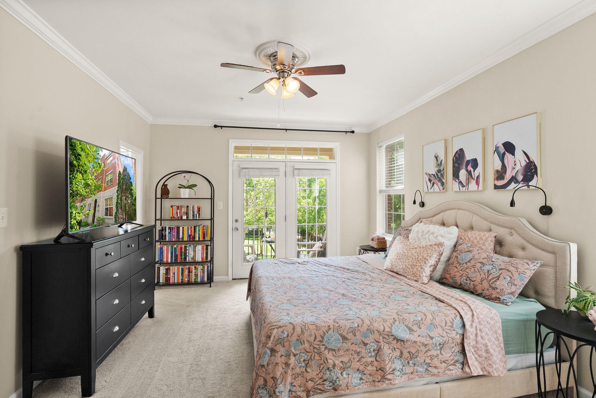 12414 A Liberty Bridge Road Fairfax, VA 22033 - Photo 17 of 38 a bedroom with a bed dresser and a window