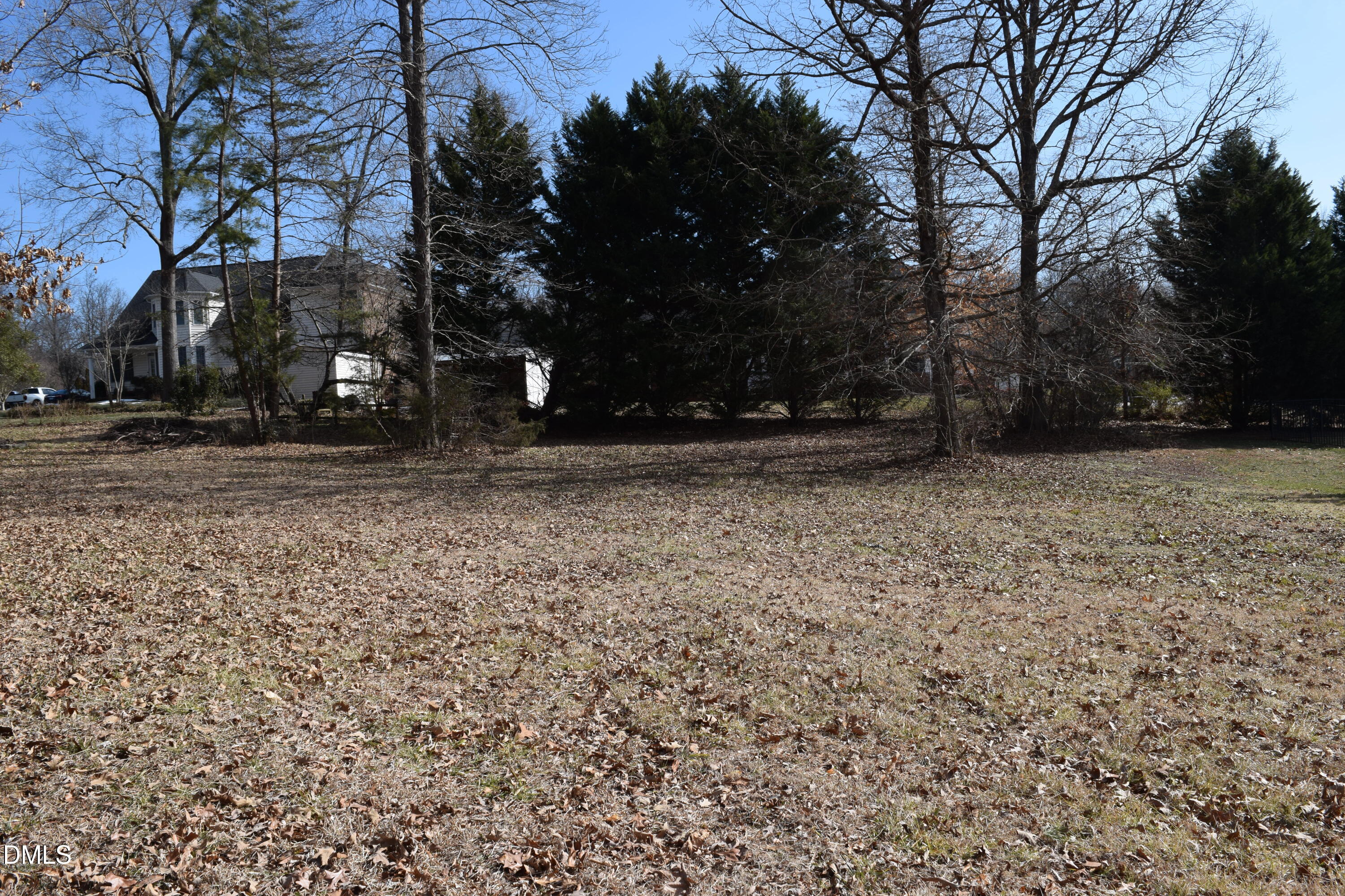 2391 Jade Court Graham, NC 27253 - Photo 3 of 4 a view of a yard with a house