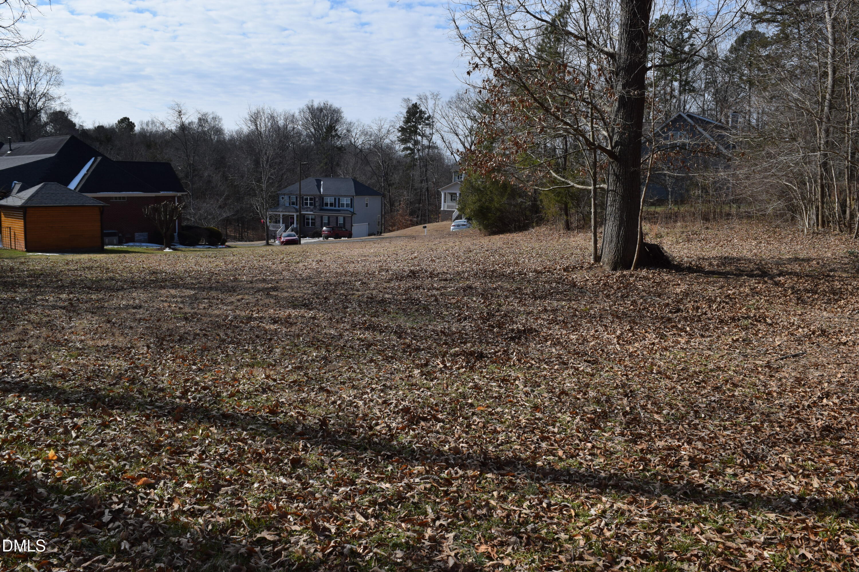 2391 Jade Court Graham, NC 27253 - Photo 4 of 4 a view of a outdoor space with trees