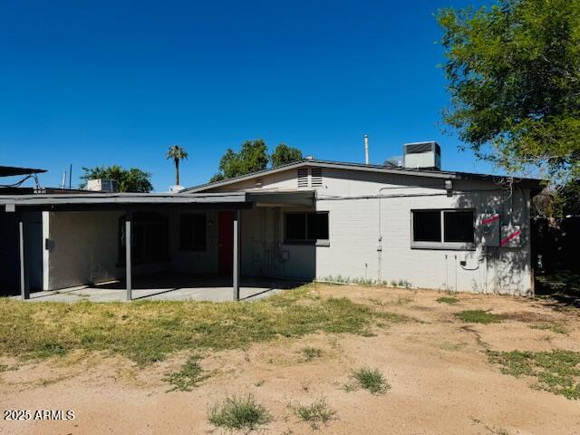 1737 West Pecan Road Phoenix, AZ 85041 - Photo 2 of 14 a house with trees in the background