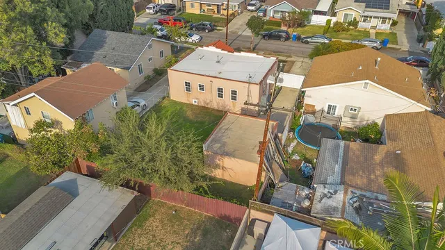 an aerial view of a house with outdoor space