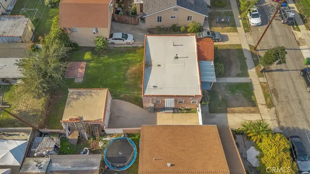 an aerial view of a house with outdoor space