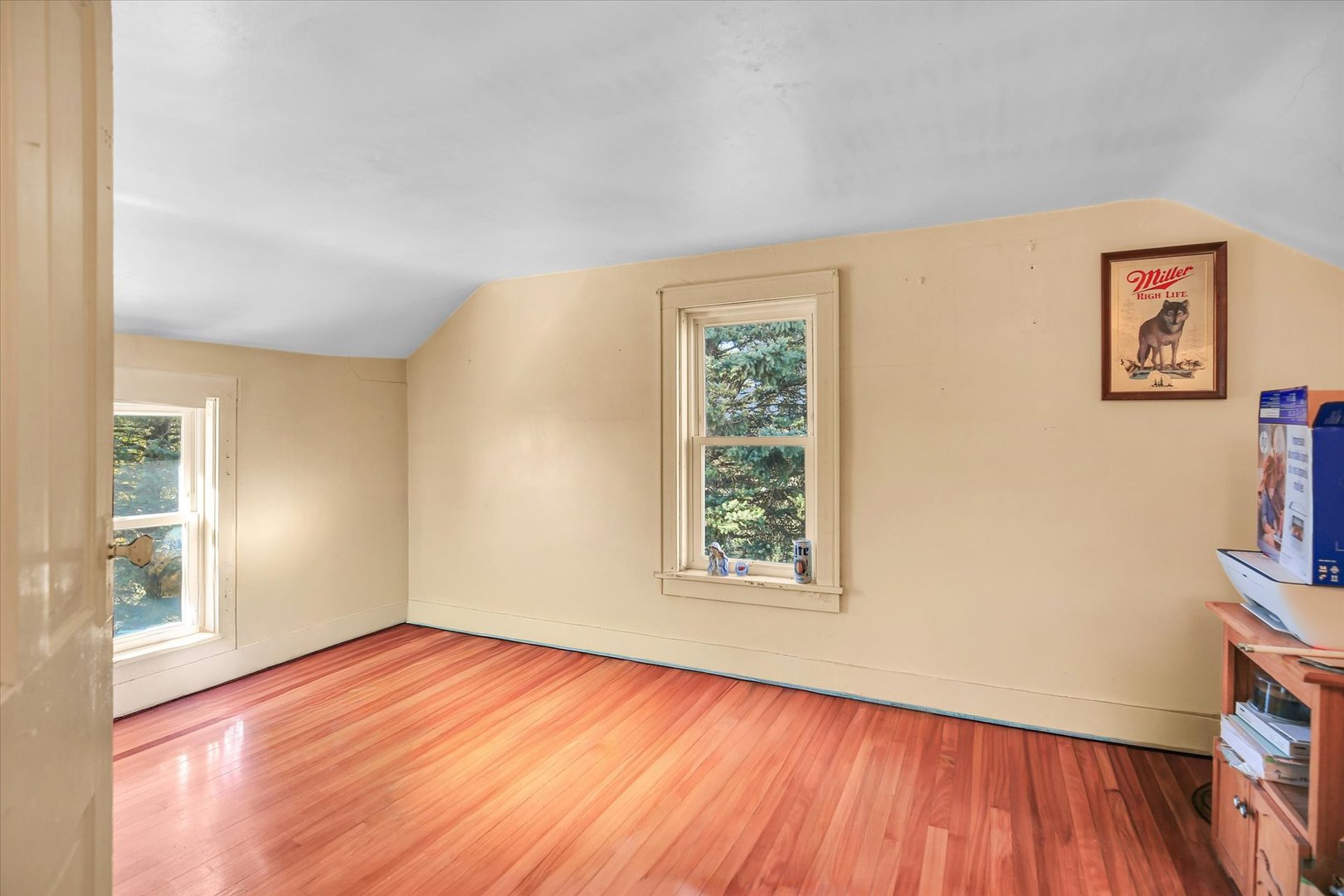 23 County Road 300 North Ivesdale, IL 61851 - Photo 37 of 45 an empty room with wooden floor and windows
