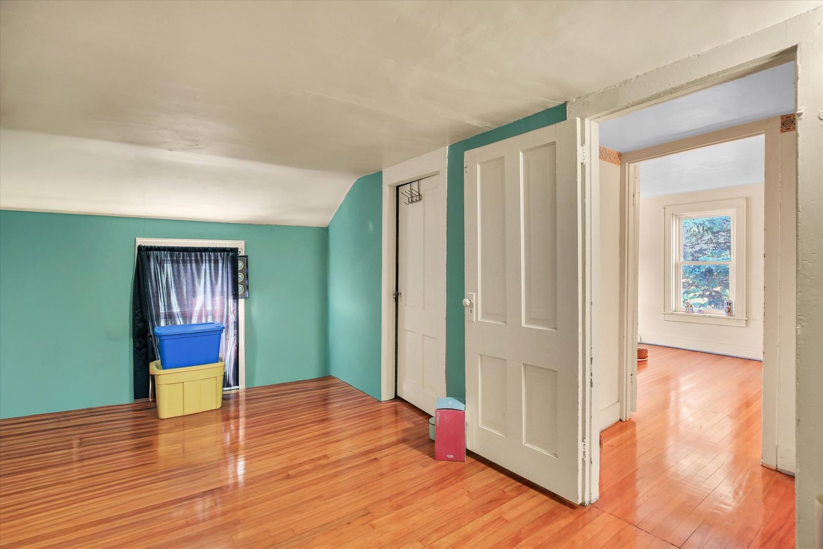 23 County Road 300 North Ivesdale, IL 61851 - Photo 43 of 45 a view of an empty room with window and wooden floor
