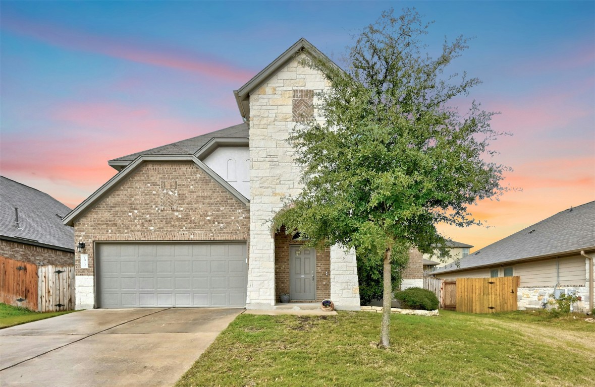 1912 Bobbywoods Lane Manchaca, TX 78652 - Photo 1 of 1 front view of a house with a yard