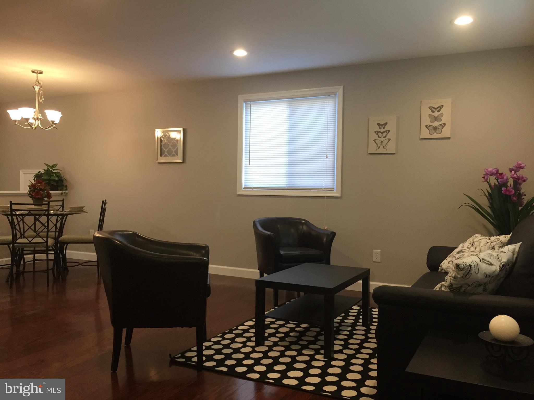 3157 Jeffland Road Baltimore, MD 21244 - Photo 4 of 19 a living room with furniture and a window