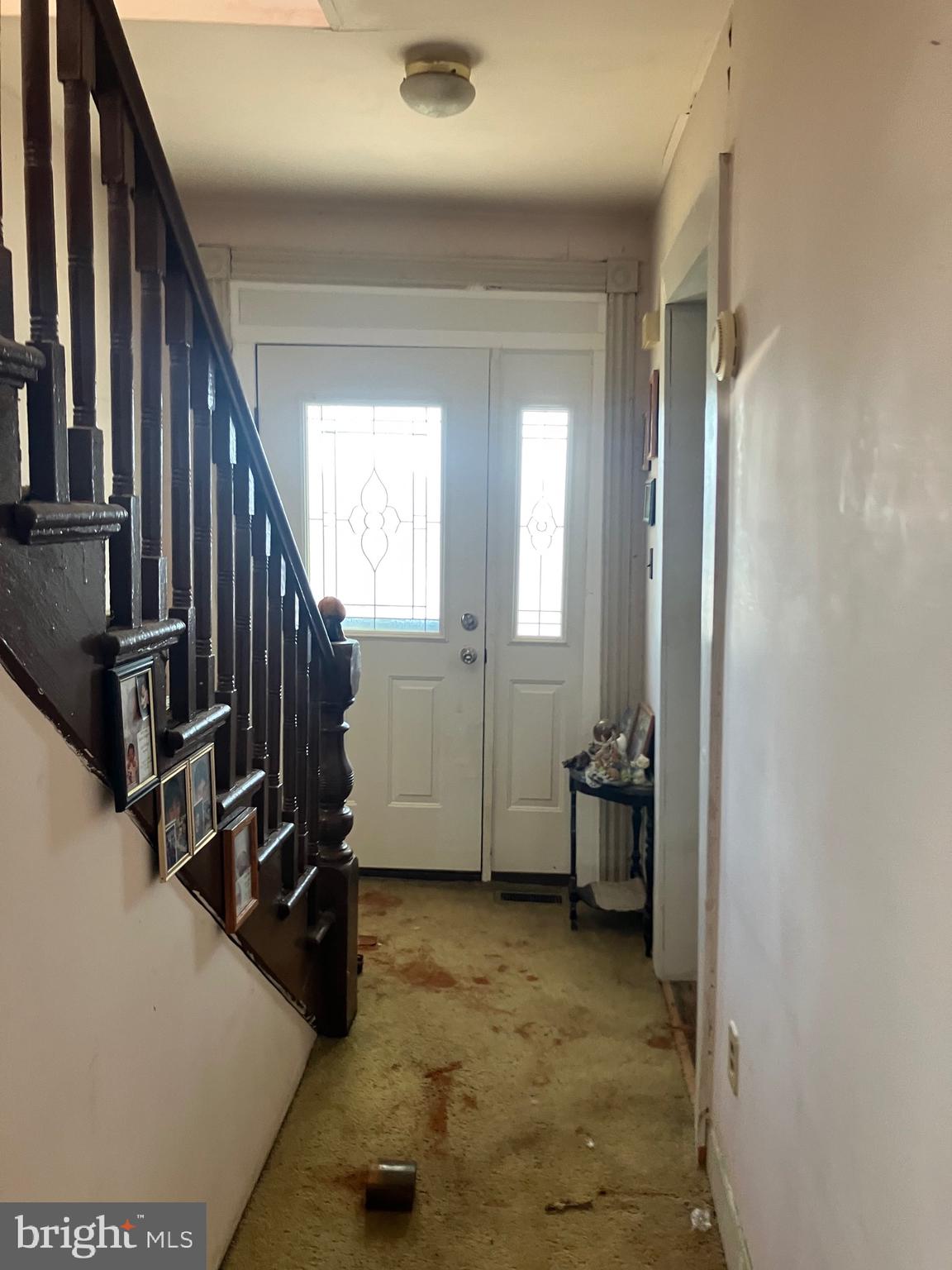 805 East B Street Brunswick, MD 21716 - Photo 17 of 31 a view of an entryway with wooden floor and stairs