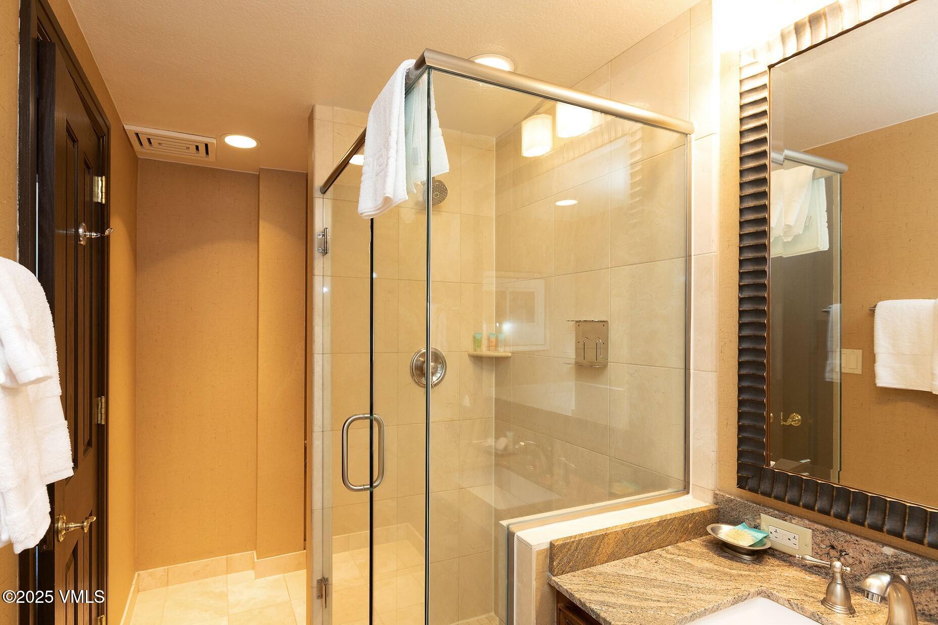 210 Offerson Road, Unit 3044 Beaver Creek, CO 81620 - Photo 21 of 21 a bathroom with a shower and a sink