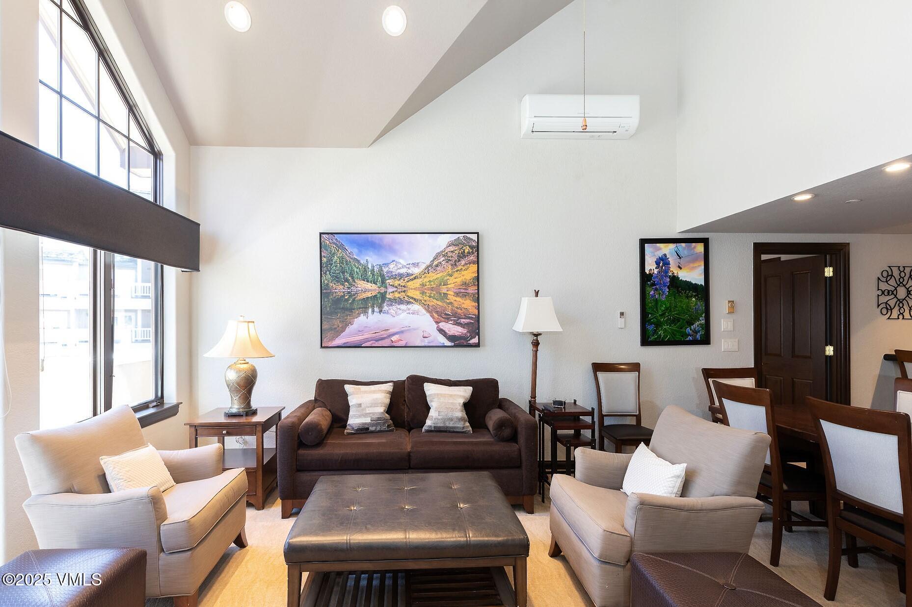 210 Offerson Road, Unit 3044 Beaver Creek, CO 81620 - Photo 3 of 21 a living room with furniture and a large window