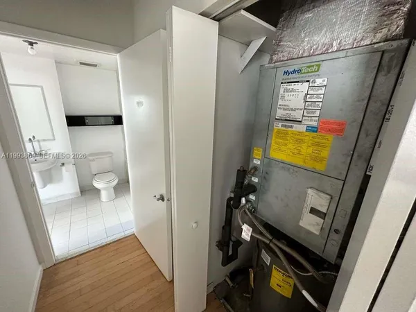 a view of a bathroom from a hallway