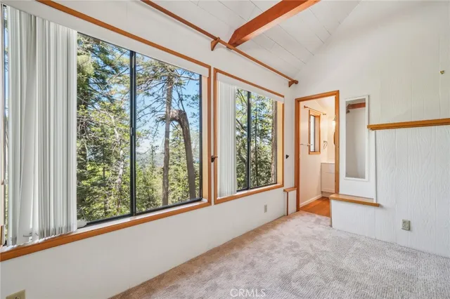 a view of a room with a large window