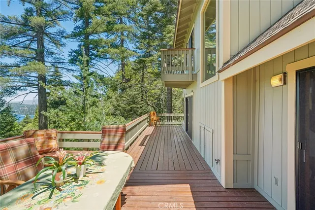 view of balcony with wooden floor and outdoor space