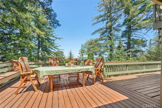 a view of roof deck with patio