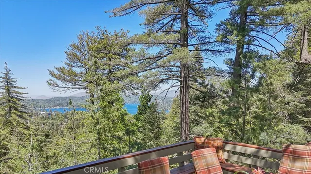 a view of a yard from a balcony