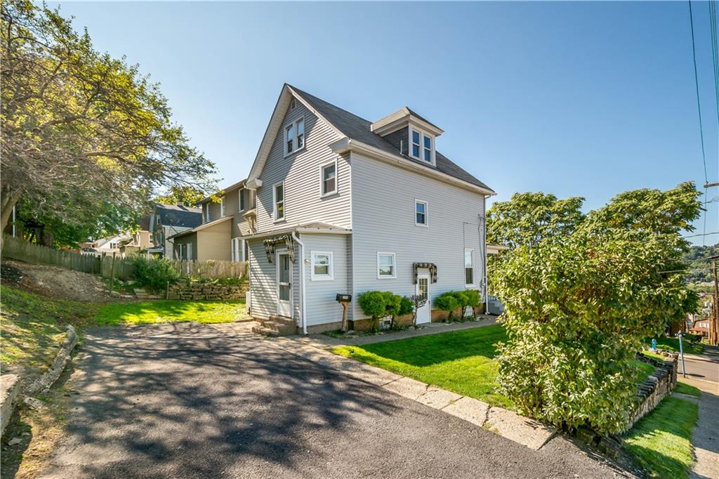 398 Elm Road Ambridge, PA 15003 - Photo 1 of 25 Paved off-street parking and a manageable yard.