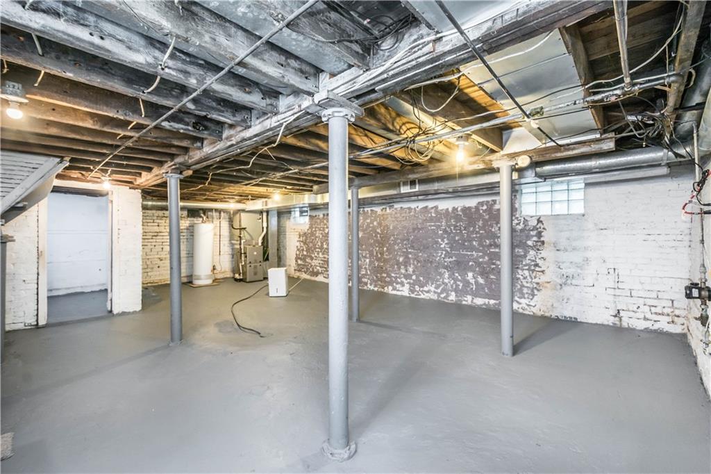 398 Elm Road Ambridge, PA 15003 - Photo 20 of 25 Basement is clean and provides lots of extra space for storage.