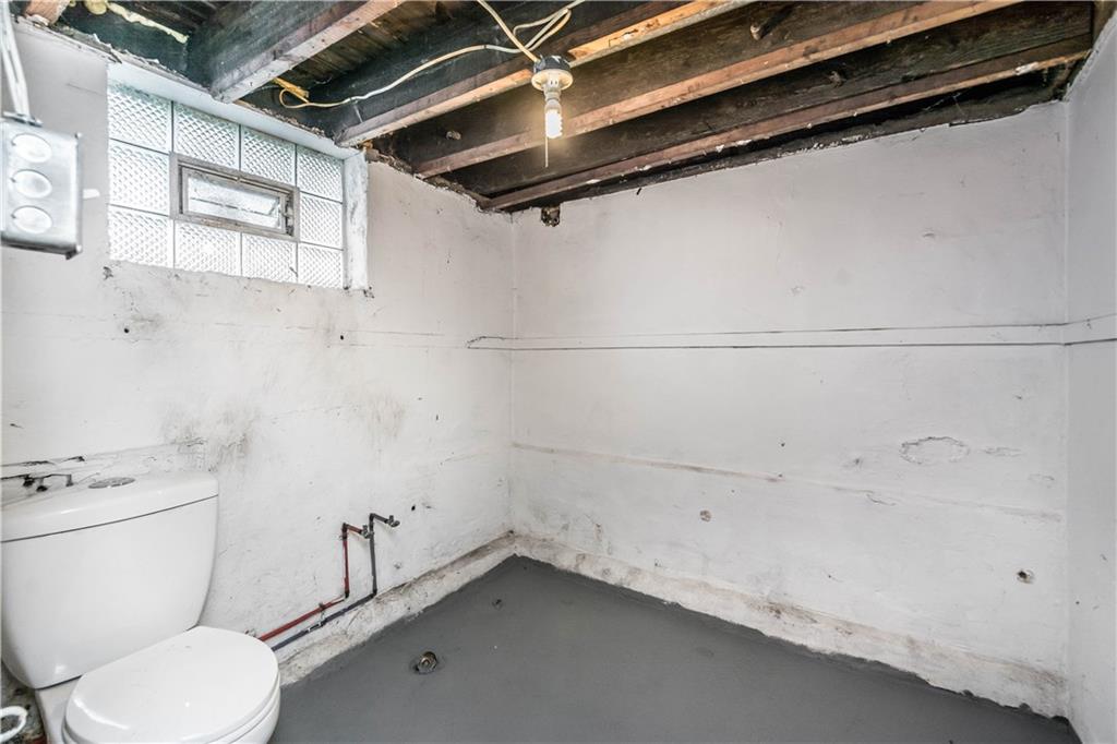 398 Elm Road Ambridge, PA 15003 - Photo 22 of 25 Basement potty and hook up for sink.