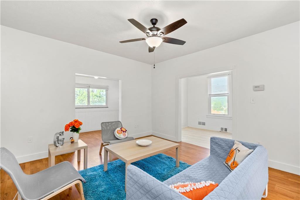 398 Elm Road Ambridge, PA 15003 - Photo 6 of 25 View into sunroom and entry- clean and bright!
