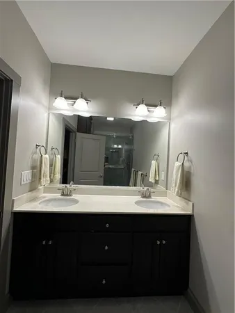 a bathroom with a shower and toilet