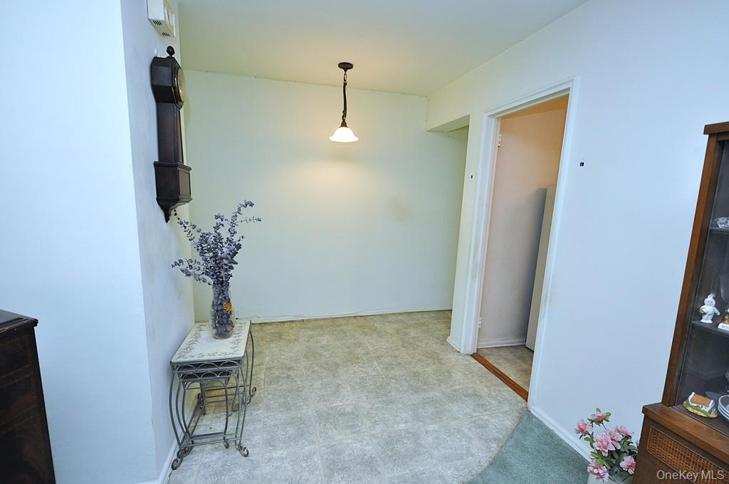 682 Tuckahoe Road, Unit 5H Yonkers, NY 10710 - Photo 18 of 24 wooden floor in an empty room