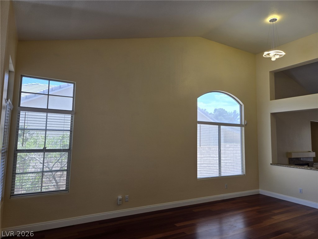 8417 San Ramon Drive Las Vegas, NV 89147 - Photo 5 of 33 High ceilings and arched windows define this inviting space.