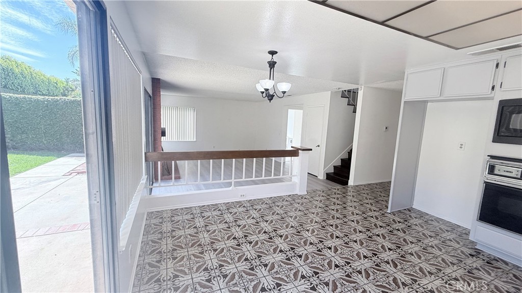 46 Christamon West Irvine, CA 92620 - Photo 14 of 63 Looking into Den