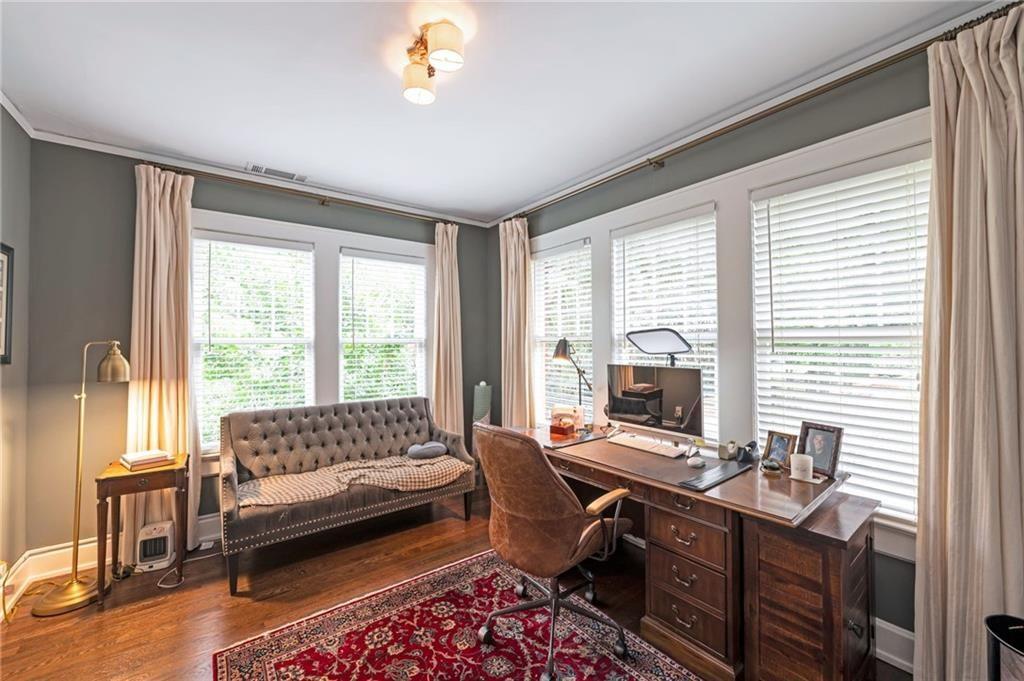 1810 East Clifton Road Northeast Atlanta, GA 30307 - Photo 27 of 50 a view of a livingroom with workspace and a couch