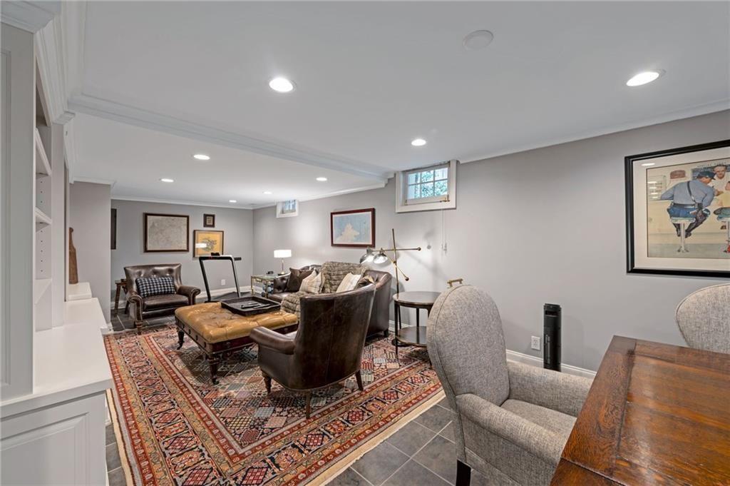 1810 East Clifton Road Northeast Atlanta, GA 30307 - Photo 35 of 50 a living room with furniture and a table