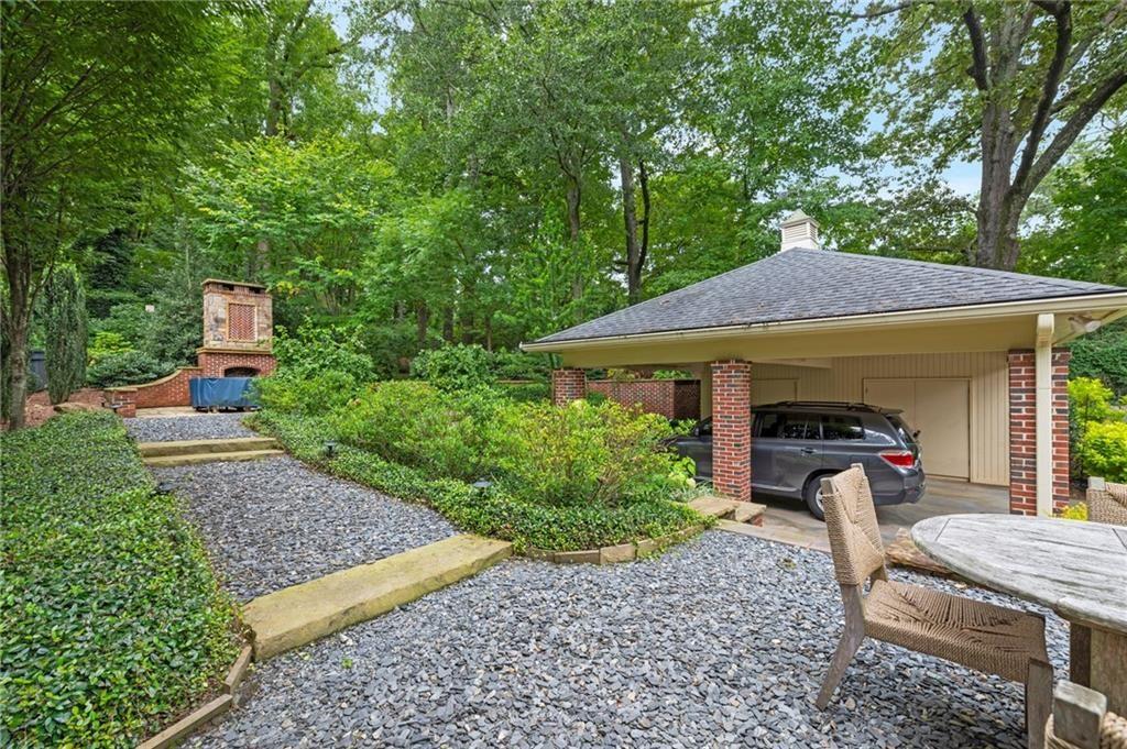 1810 East Clifton Road Northeast Atlanta, GA 30307 - Photo 46 of 50 a front view of a house with garden