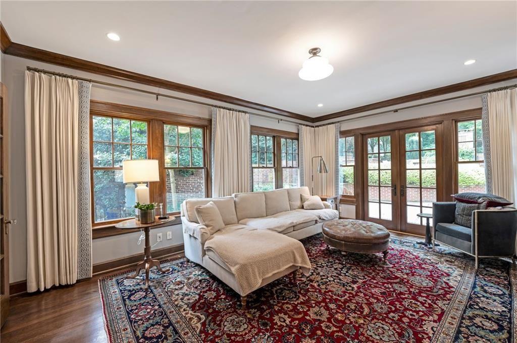 1810 East Clifton Road Northeast Atlanta, GA 30307 - Photo 10 of 50 a living room with furniture and a large window