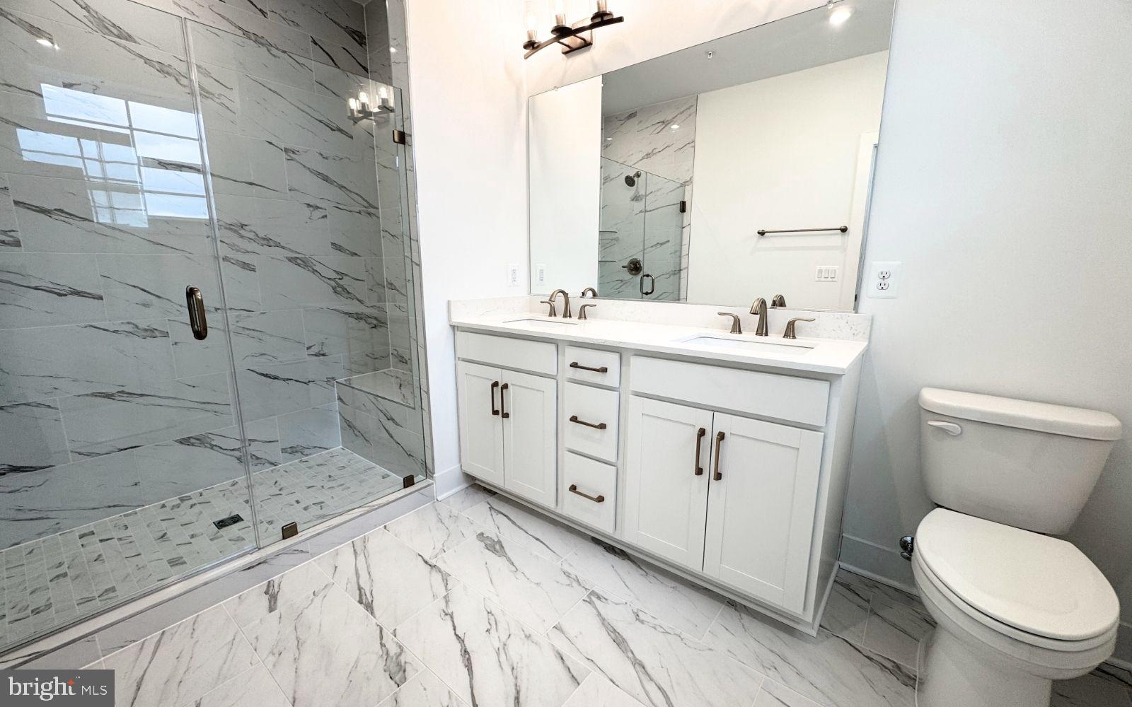 74 Valerian Loop, Unit 1 Stafford, VA 22554 - Photo 11 of 47 Elegant marble bath retreat.