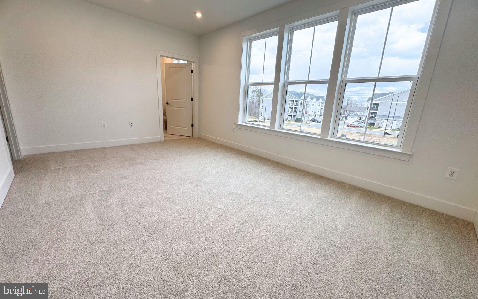 74 Valerian Loop, Unit 1 Stafford, VA 22554 - Photo 12 of 47 Bright and airy room with large windows.