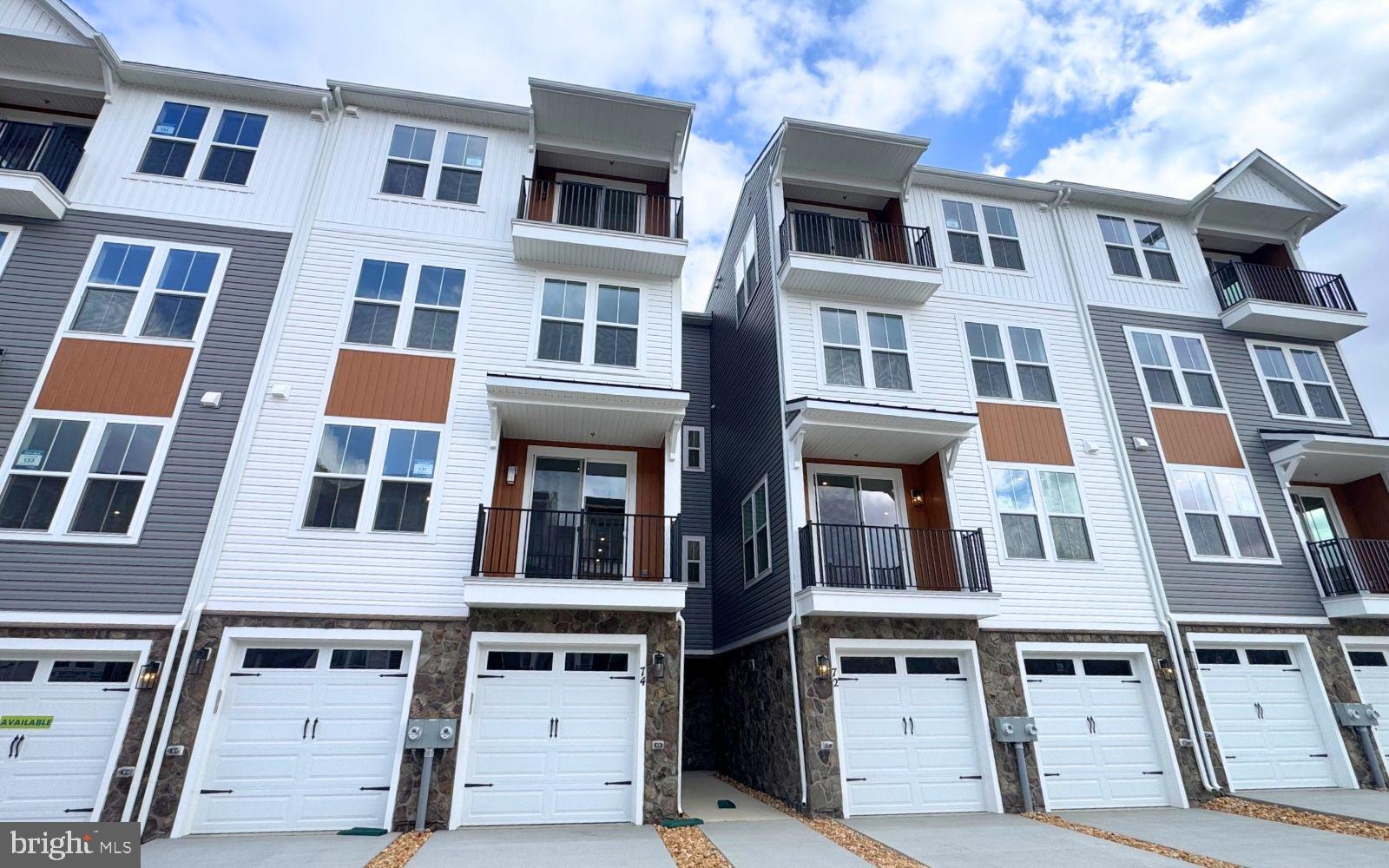74 Valerian Loop, Unit 1 Stafford, VA 22554 - Photo 2 of 47 Modern townhomes with stylish facades.
