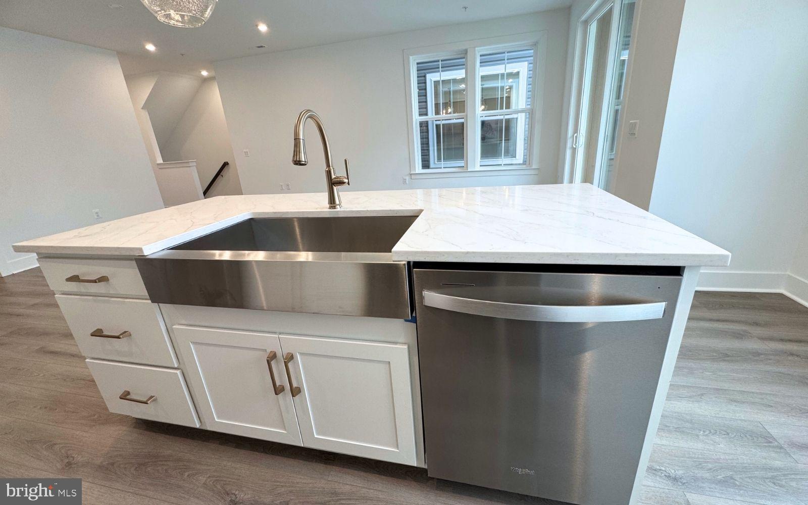 74 Valerian Loop, Unit 1 Stafford, VA 22554 - Photo 7 of 47 Sleek modern kitchen with island charm.