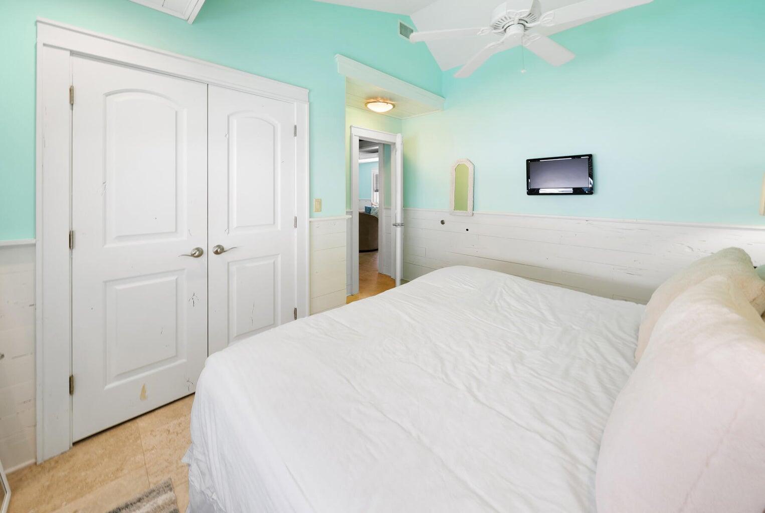 36 Green Street Inlet Beach, FL 32461 - Photo 12 of 29 a bedroom with a bed and a painting on the wall