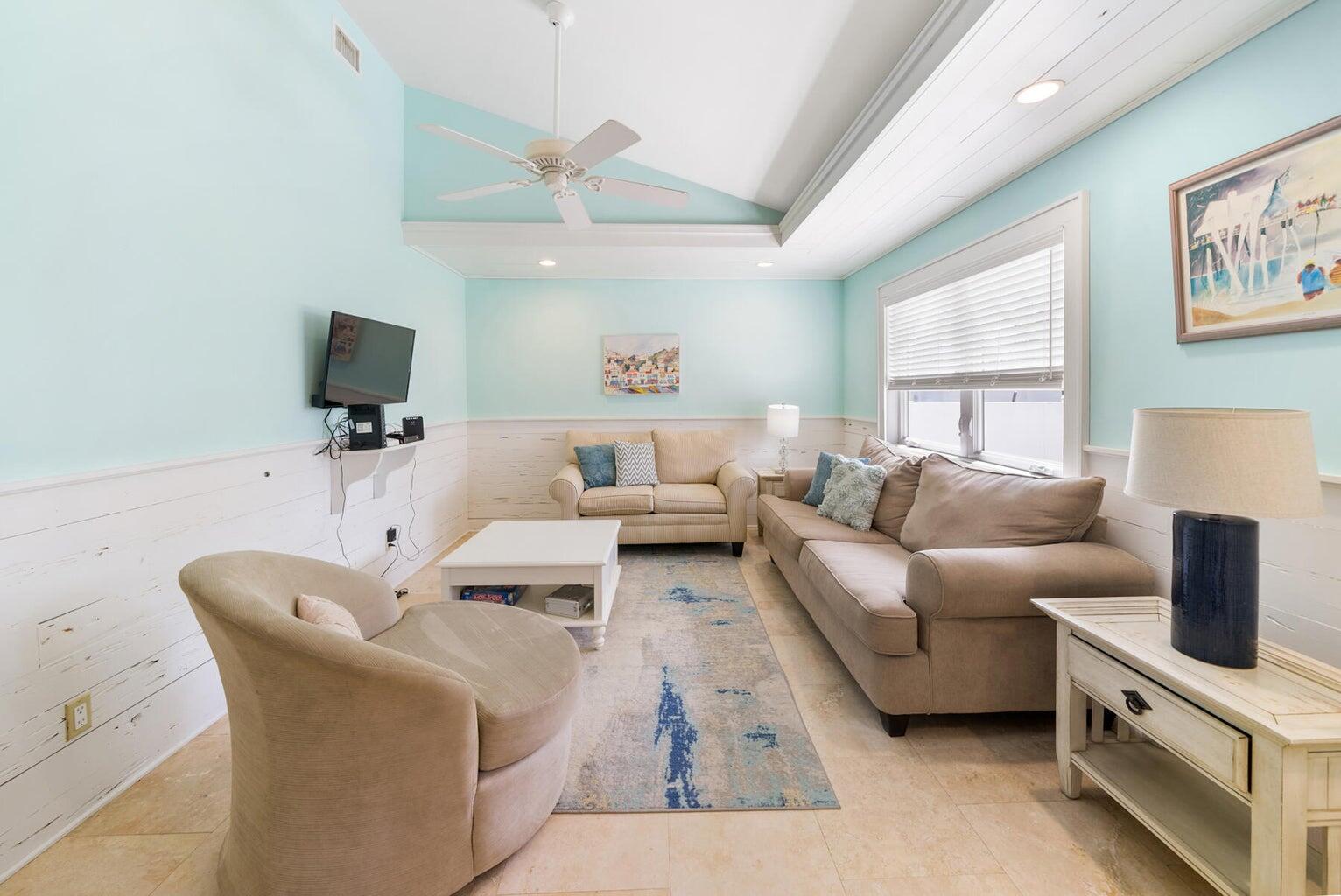 36 Green Street Inlet Beach, FL 32461 - Photo 21 of 29 a living room with furniture and a flat screen tv