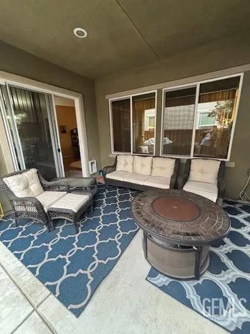 a living room with a couch and a table
