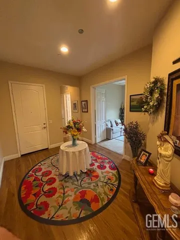 a view of a living room and dining room