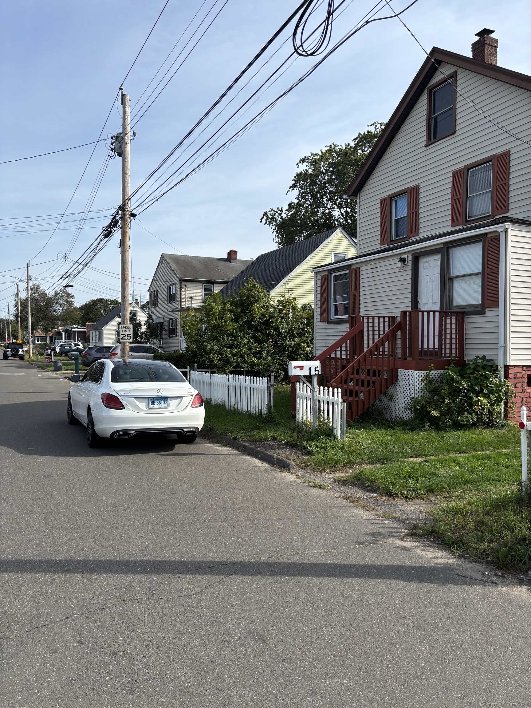 15 Harding Avenue Stratford, CT 06615 - Photo 25 of 38 a white house covered with tall trees