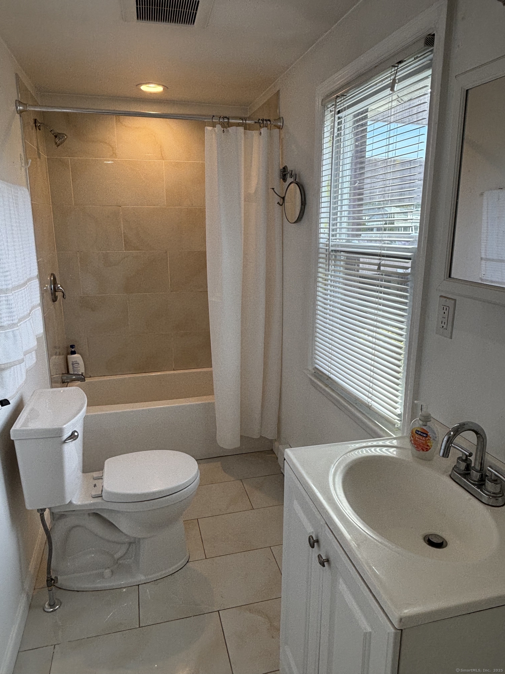 15 Harding Avenue Stratford, CT 06615 - Photo 29 of 38 a bathroom with a sink toilet and shower