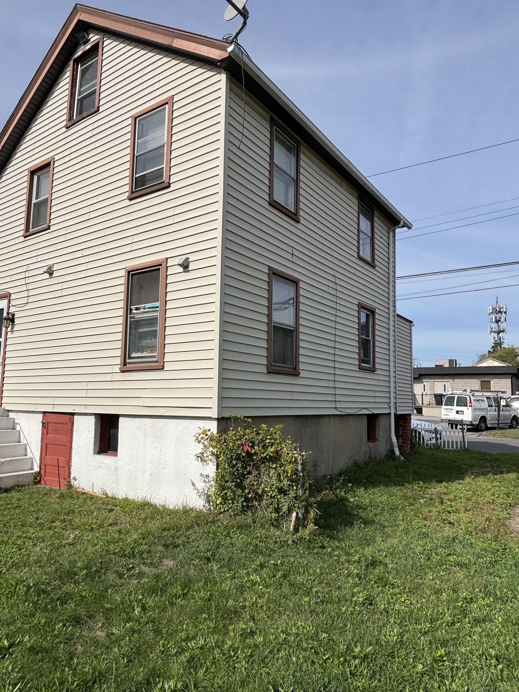 15 Harding Avenue Stratford, CT 06615 - Photo 6 of 38 a front view of a house with a yard