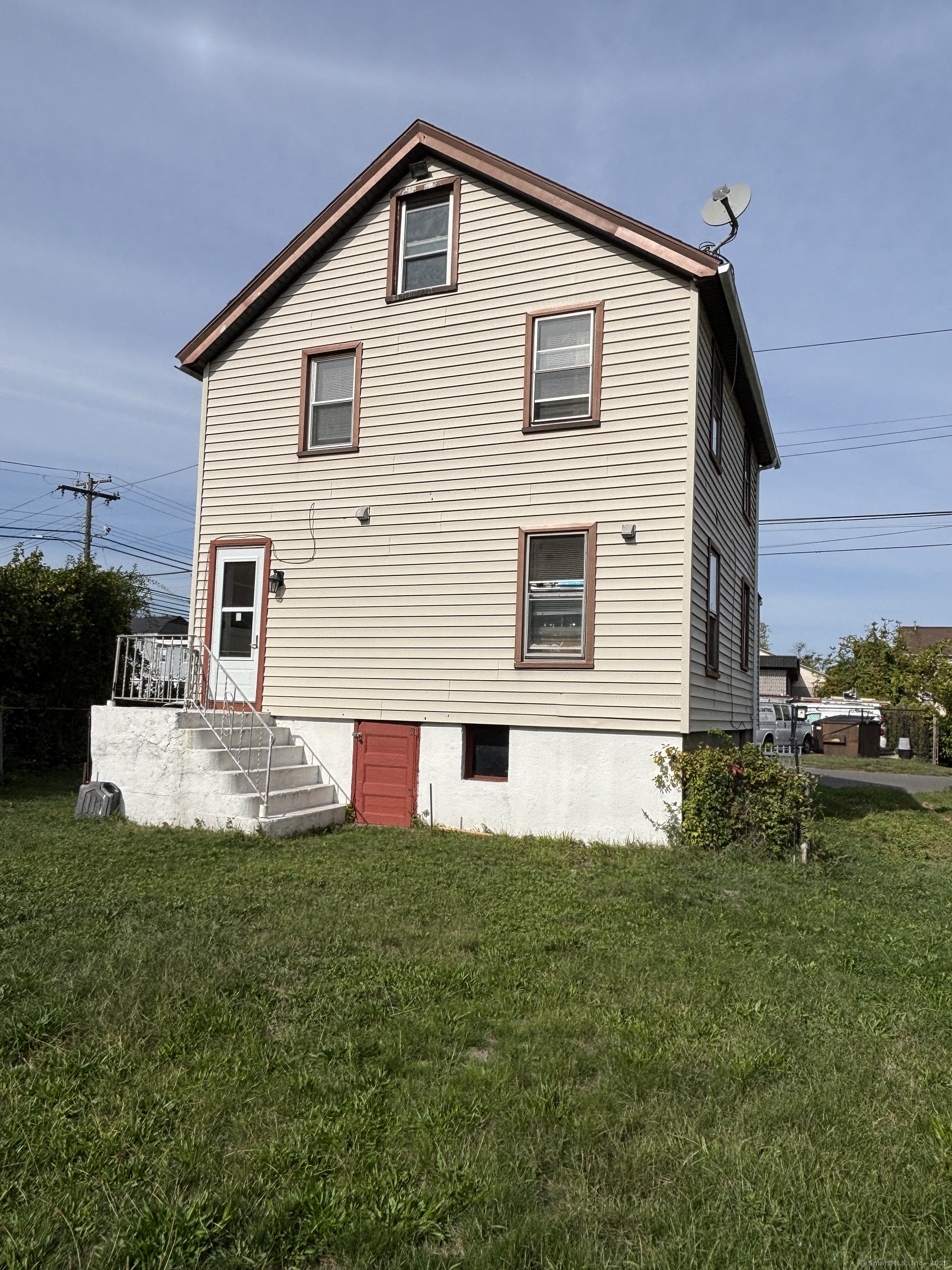 15 Harding Avenue Stratford, CT 06615 - Photo 7 of 38 a front view of house with yard