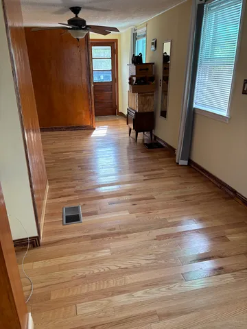 a view of livingroom with furniture and wooden floor