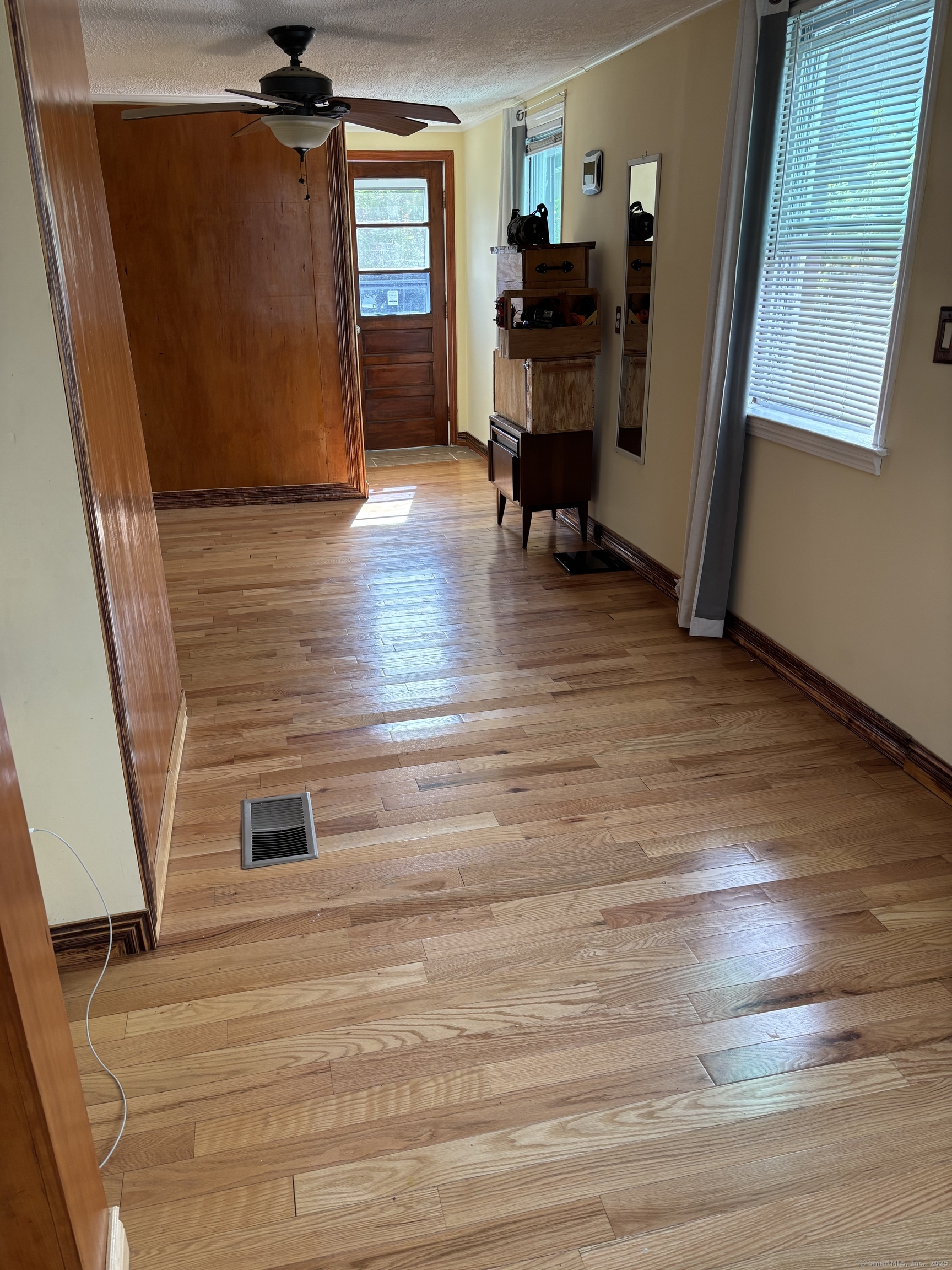 15 Harding Avenue Stratford, CT 06615 - Photo 9 of 38 a view of livingroom with furniture and wooden floor