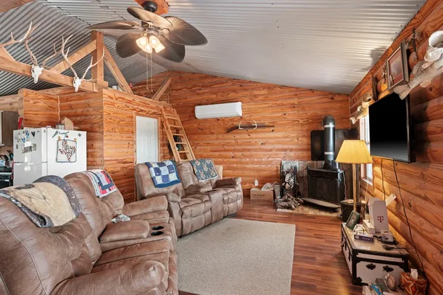 a bathroom with a sink mirror and toilet